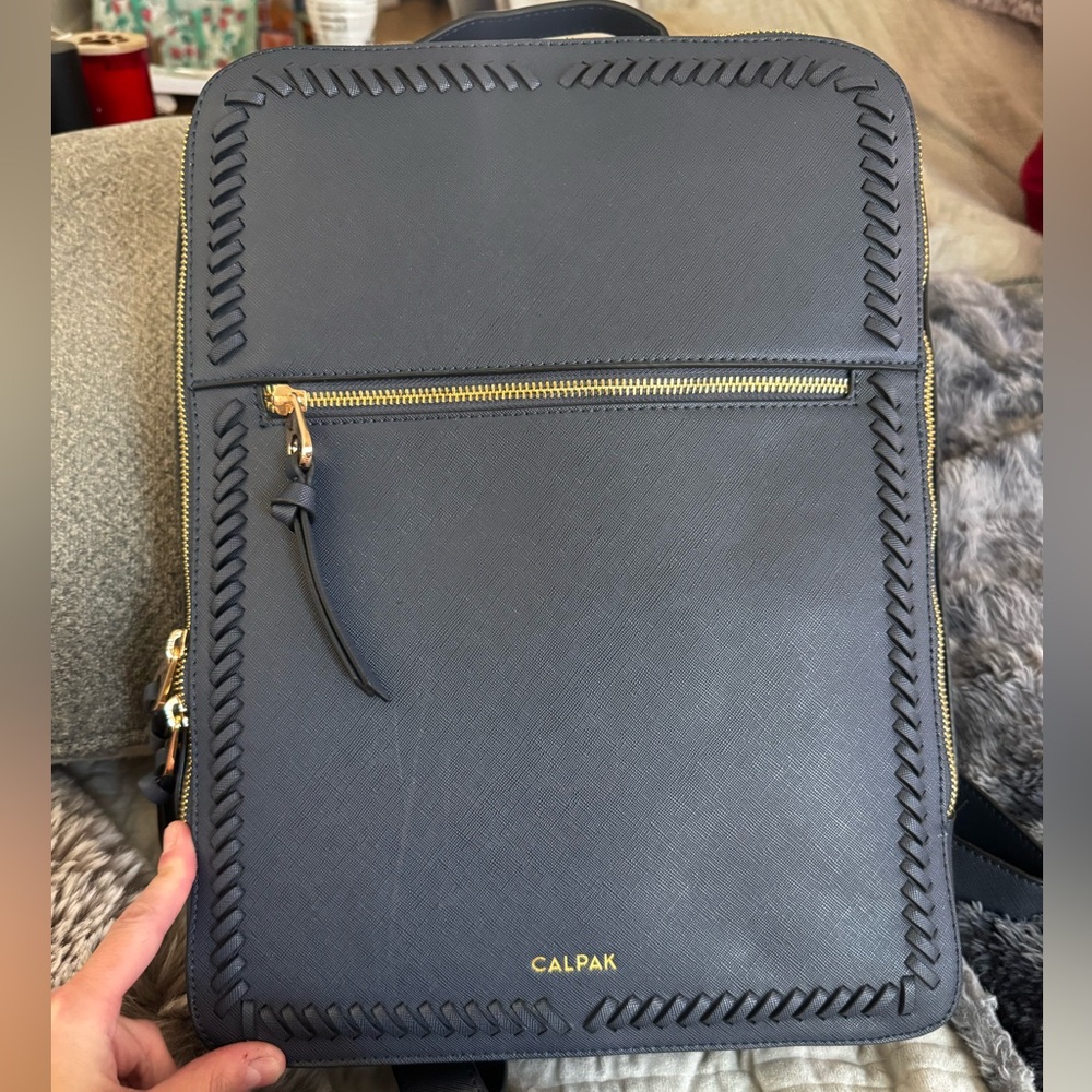 Calpak Blue Backpack with Whipstitch Detailing